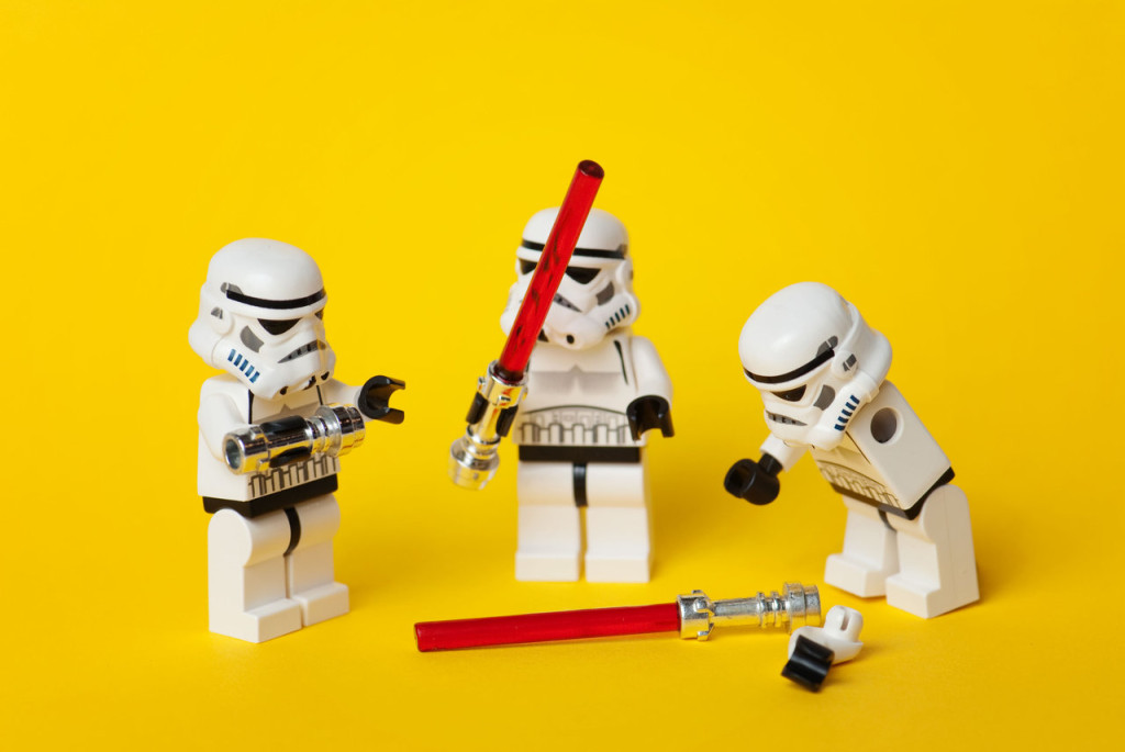 LEGO Stormtroopers playing with two lightsabers