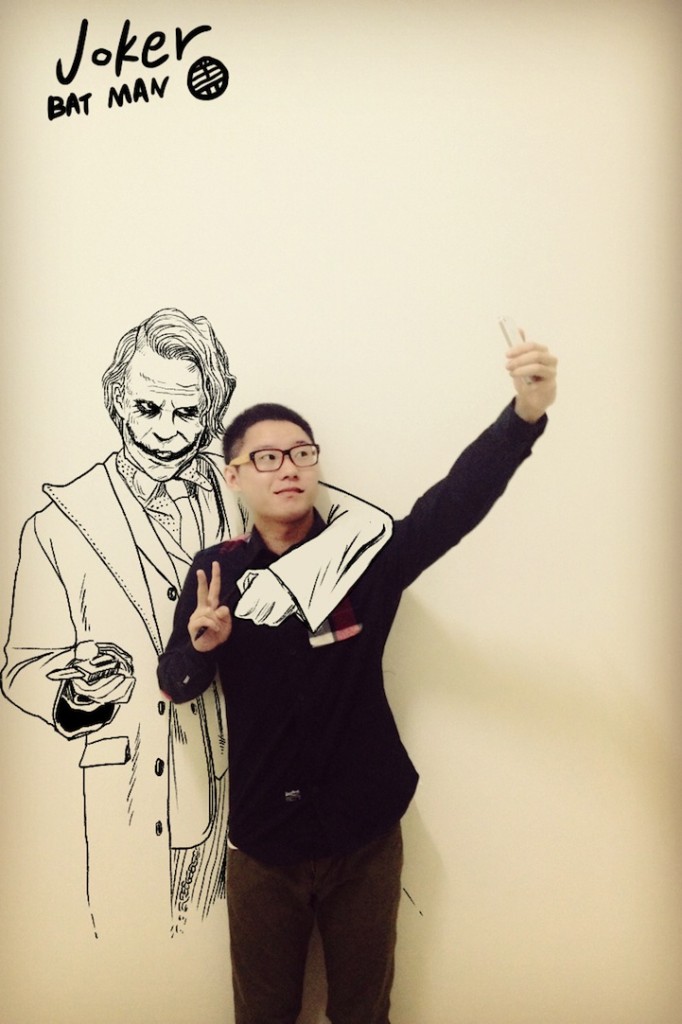 Taking a smartphone picture with The Joker